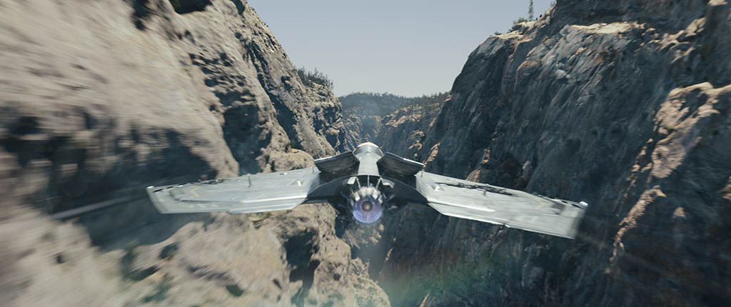 Older Adam pilots a time jet through a CGI canyon. Much of that environment was digitally created, including a digital valley, a digital rock surface and a digital cave. 