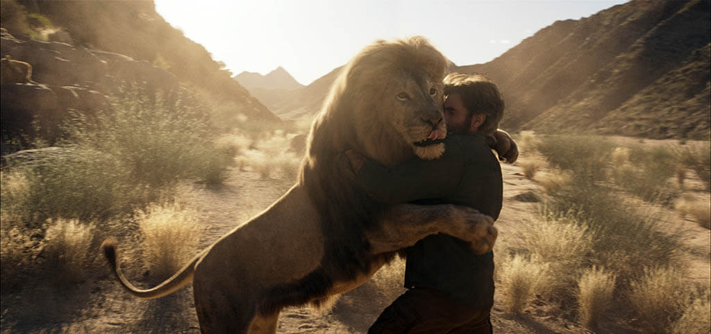 Special costumes were created for stunt performers to interact with Sharlto Copley, which were subsequently taken over by CG lions.