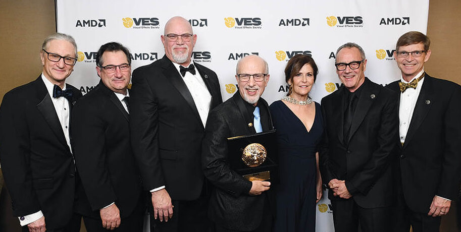 44.Eric Roth, former VES Executive Director, is flanked by former VES Board Chairs Jeff Okun, VES; Jeff Barnes; Mike Chambers, VES; Roth; current Chair Lisa Cooke; Pixar GM & President Jim Morris, VES; and Carl Rosendahl, VES. 
