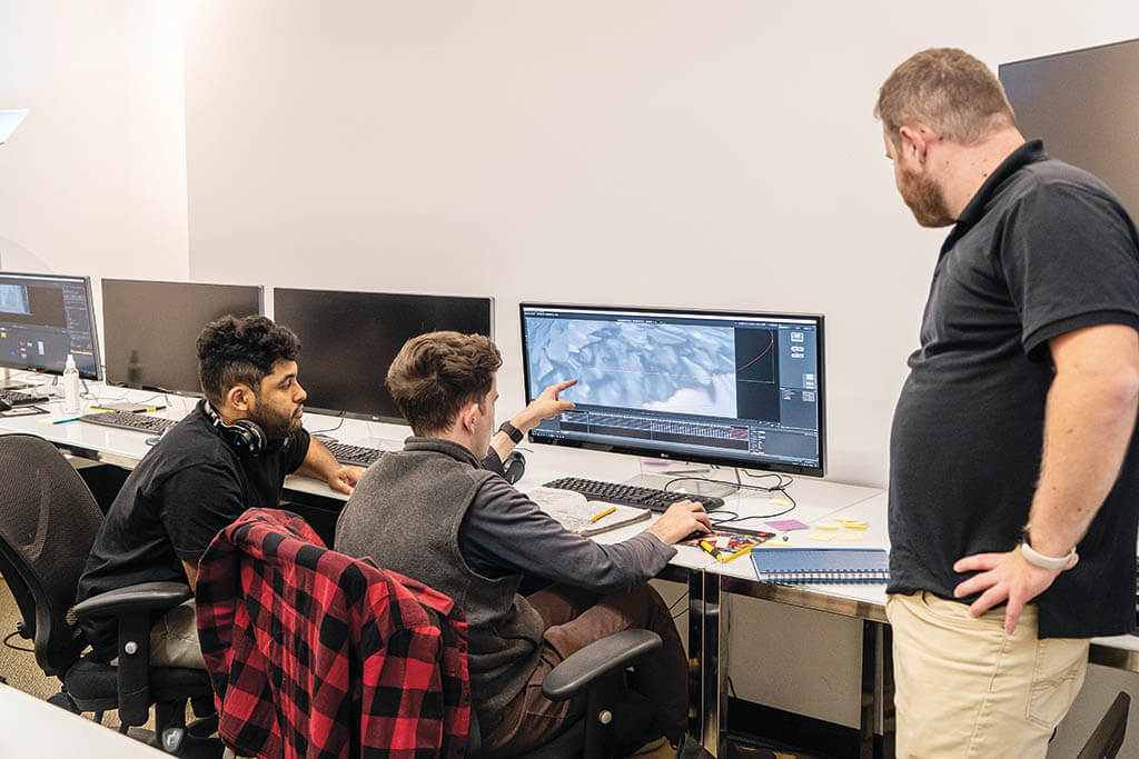 Solving visual effects problems at Exceptional Minds, which cultivates skills of artists in the autism spectrum. (Image courtesy of Exceptional Minds)