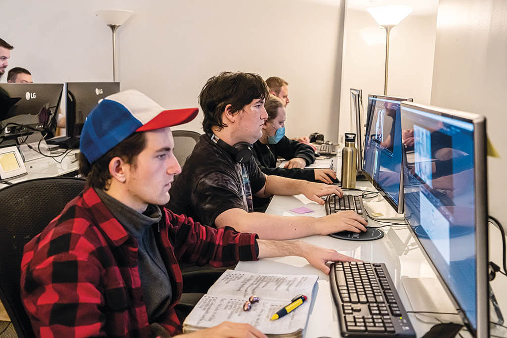 VFX artists working at Exceptional Minds, which addresses an underrepresentation of neurodiverse artists in the industry. (Image courtesy of Exceptional Minds)