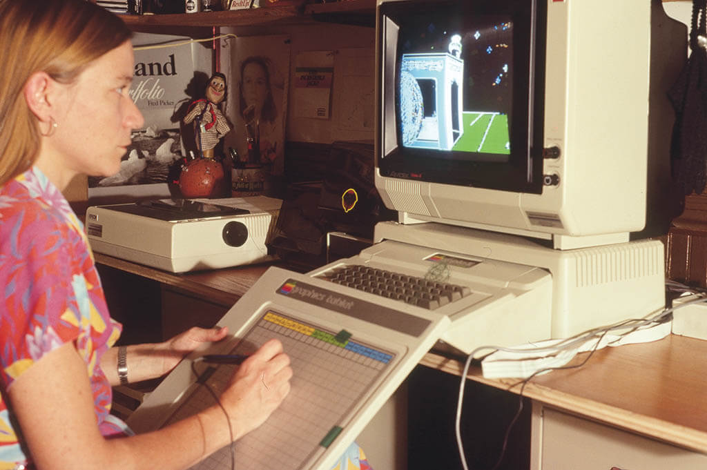 Working on her Master’s thesis on her Apple II computer, 1983.