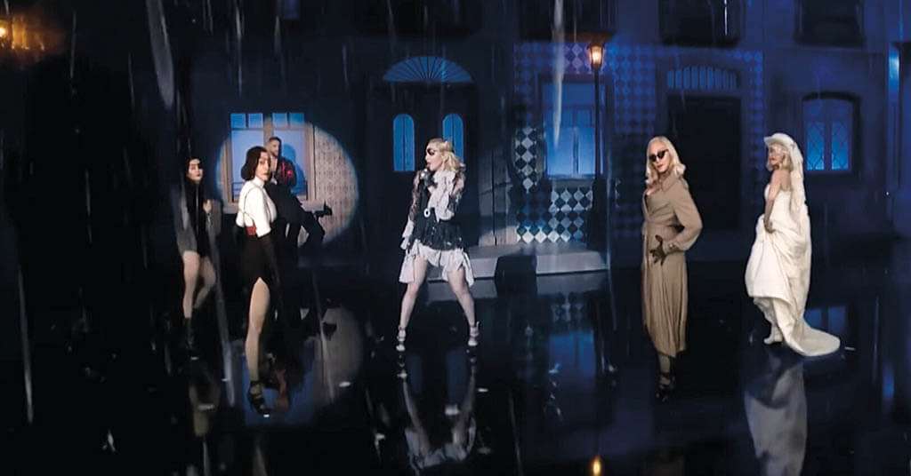 Five Madonnas with singer Maluma in background. Sequin AR, Arcturus, Dimension Studios, Reflector Entertainment, stYpe and Brainstorm collaborated on the project powered by Unreal Engine. (Image courtesy of NBC and Dick Clark Productions)