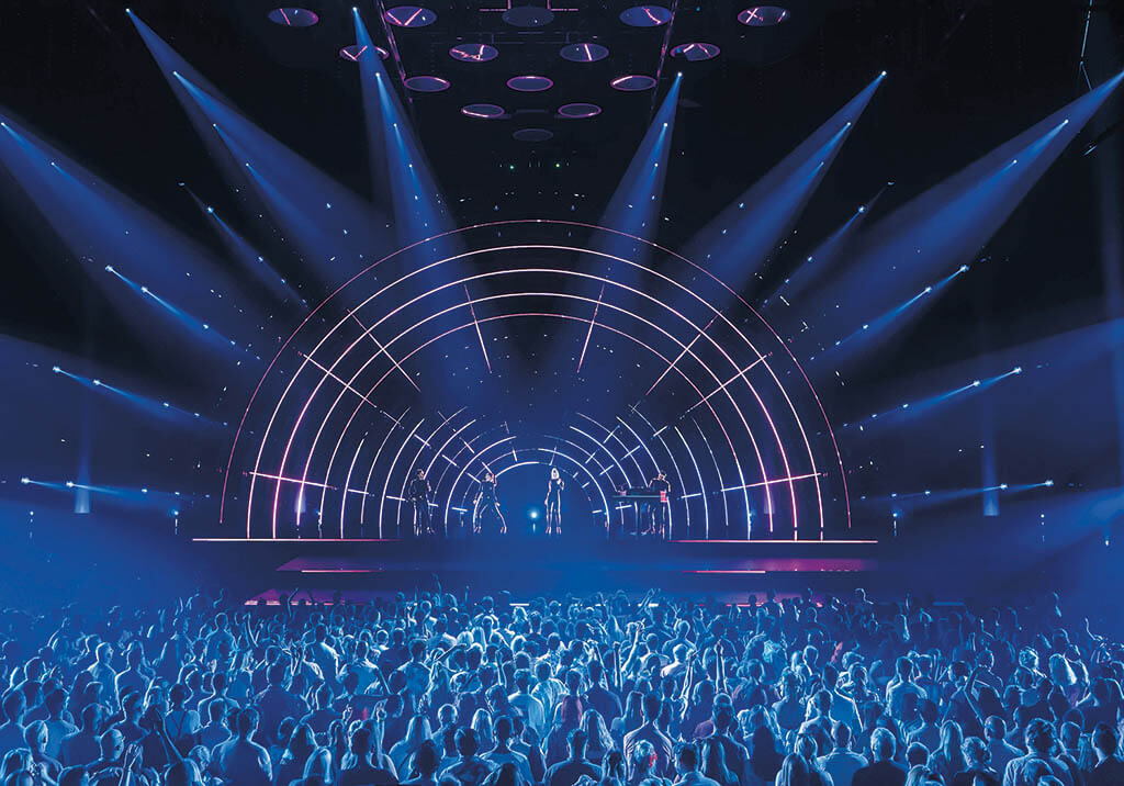 ABBA avatars on stage in lower center. The show’s elaborate lighting and live musicians help bring ABBA’s music to life. (Image courtesy of ILM and ABBA)