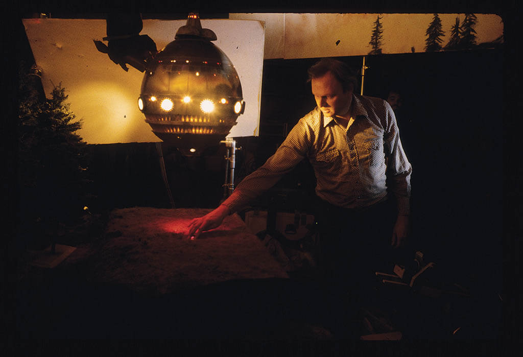 As with Close Encounters of the Third Kind, Murren got to shoot a dramatic sequence with an alien spaceship for E.T. the Extra-Terrestrial.