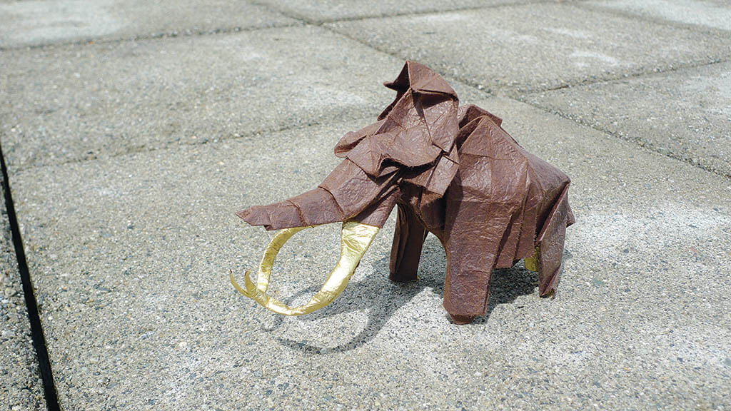 Origami is a hobby that has proven useful to Bernard in solving animation problems. (Mammoth design by Satoshi Kamiya)