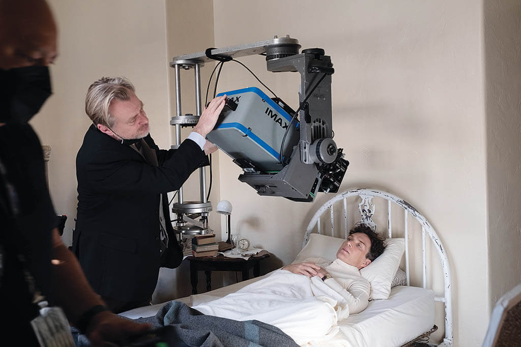 Christopher Nolan adjusts IMAX camera over Cillian Murphy (portraying J. Robert Oppenheimer).Oppenheimer was shot primarily in IMAX. (Photo: Melinda Sue Gordon) 