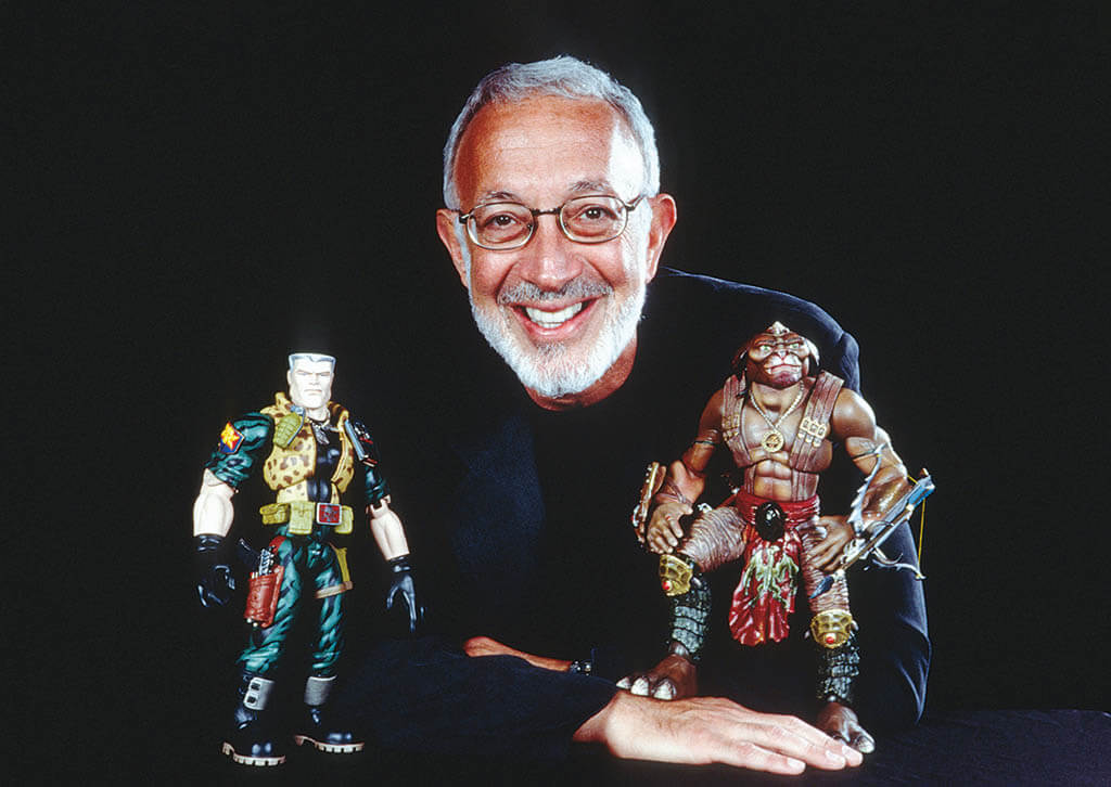 Stan Winston poses with the Chip Hazard and Archer puppetscreated by SWS for Joe Dante’s Small Soldiers. 