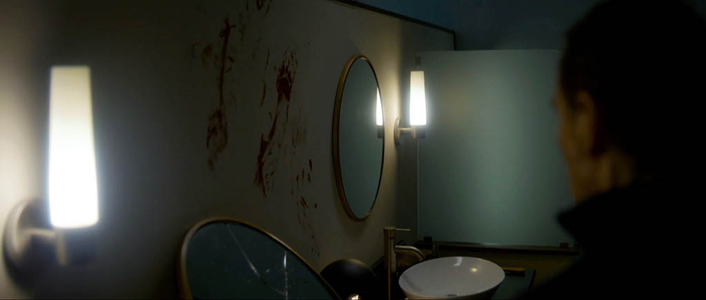 Bloodstains were added later in post-production. 