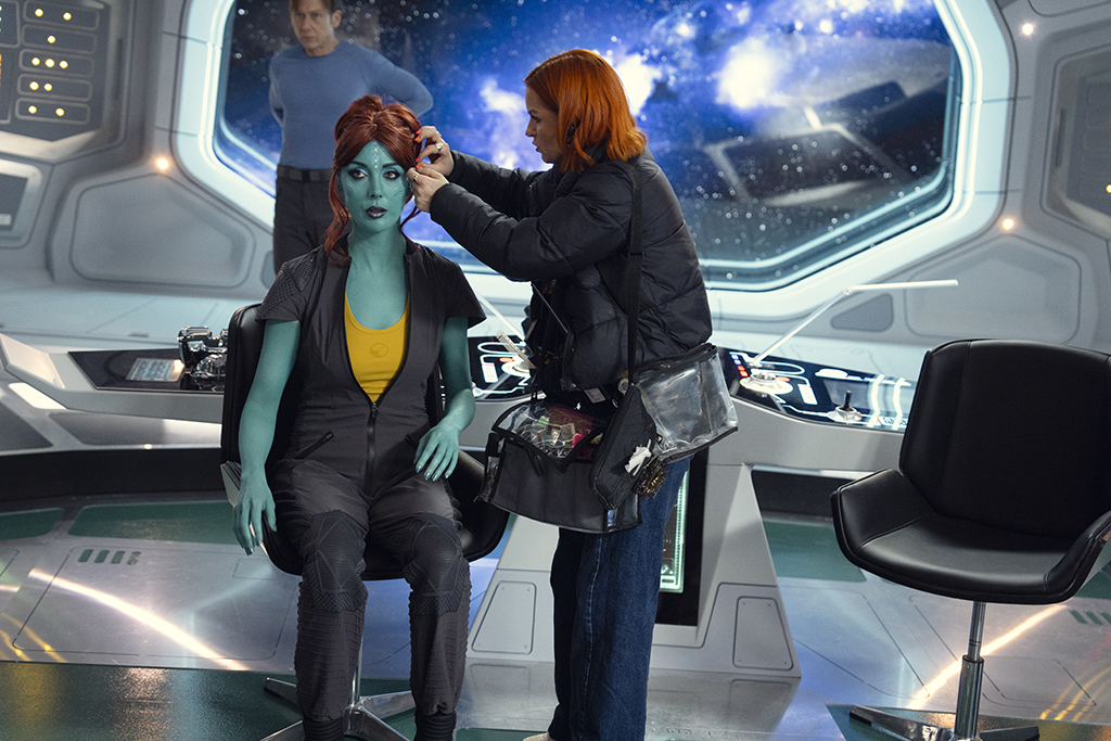 The blue skin of Elena Tulaska (Milanka Brooks) was achieved with practical makeup. 