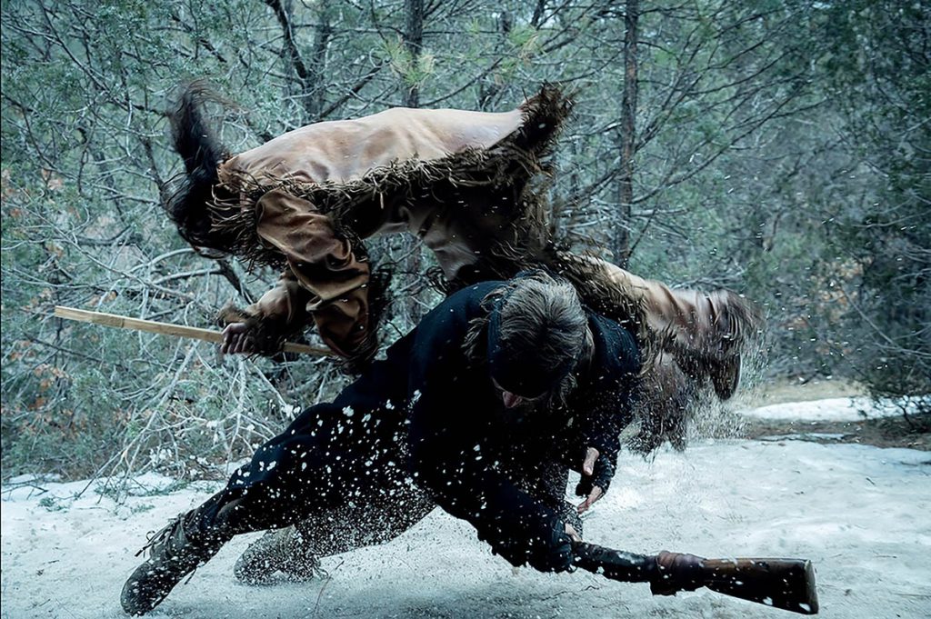 Blood, weapon effects and period-accurate muzzle flashes heightened the intensity of the brutal fight sequences in American Primeval. The natural elements and violence reflected the harsh realities of the American west in 1857. (Image courtesy of Netflix)