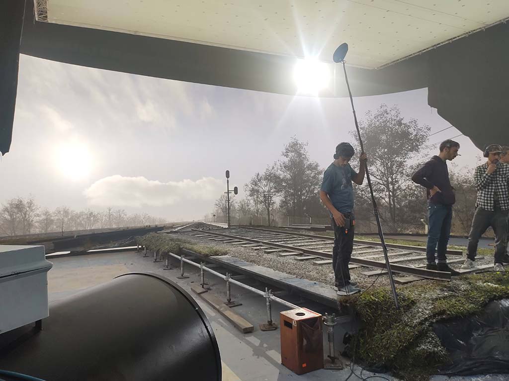 A partial train-track set was built on the virtual production stage.