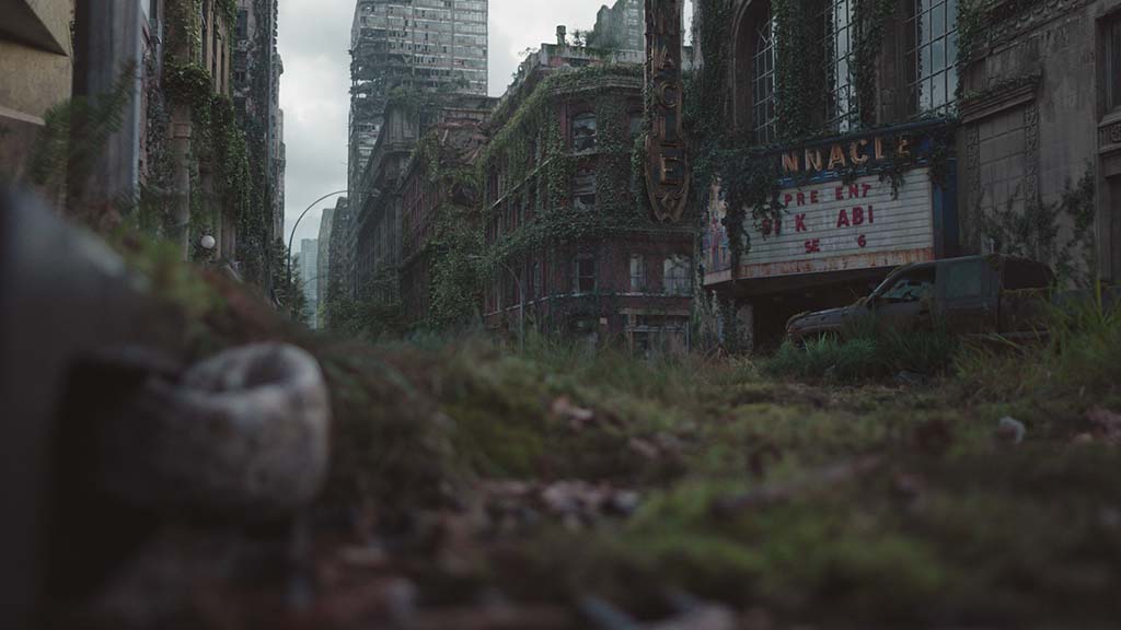 The Pinnacle Theatre was based on the real Paramount Theatre in Seattle. DNEG's Environment team extended the city street in CG and dressed it with vegetation and ivy.