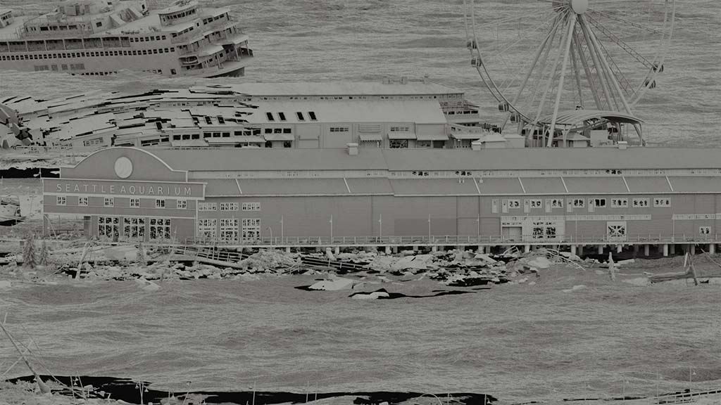 Full CG assets were built for a number of locations, including the Seattle Aquarium and Seattle Great Wheel, based on the real-world locations, with slight design alterations to match concept art and set design.